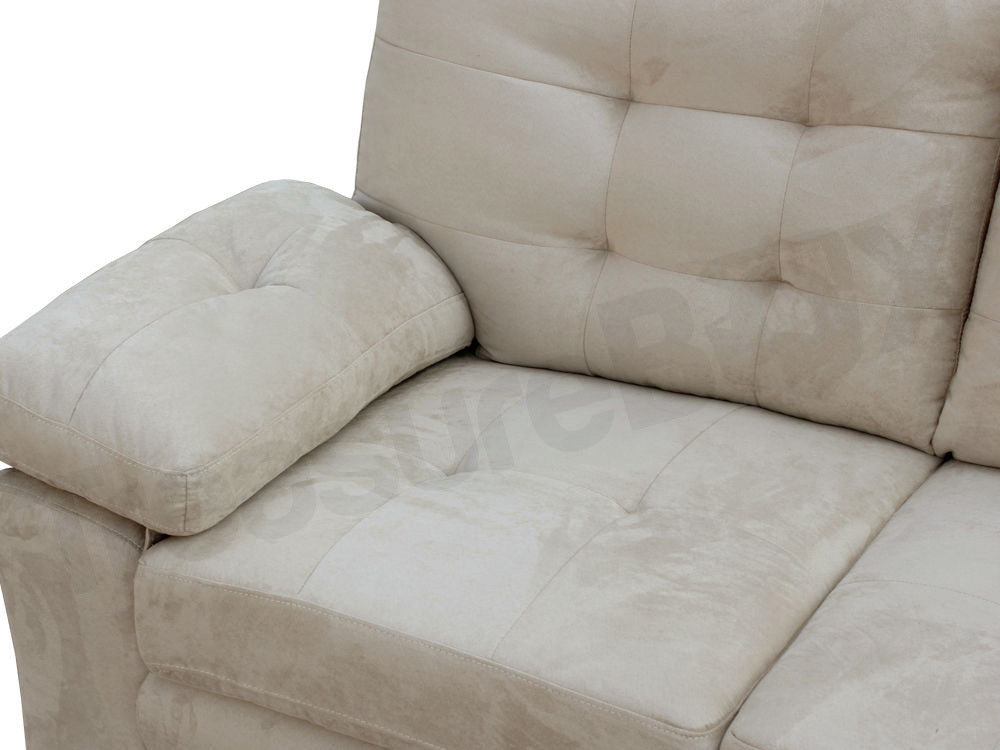 Close-up of the LAWRENCE 2-seater sofa, showcasing its tufted back and plush armrest for ultimate comfort.
