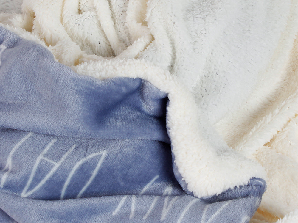 Cozy double layer fleece blanket throw featuring soft microfiber fabric in blue and cream colors.