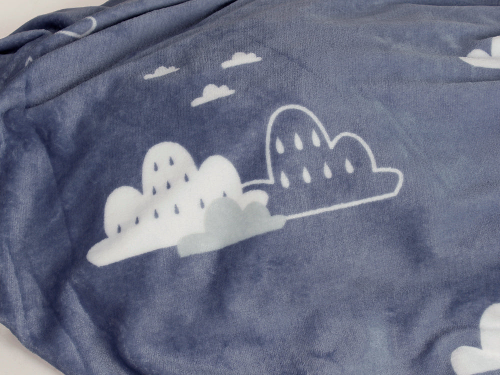 Cozy blue fleece blanket throw featuring soft cloud patterns, perfect for snuggling during chilly nights.