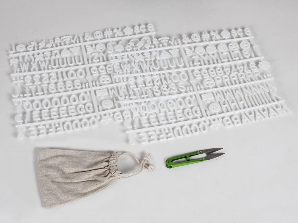 340 pieces of white felt letters and emojis for DIY projects, including scissors and a storage bag, ideal for customizing a letter board.