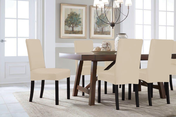 4PCS beige dining chair cover set enhancing a modern dining room with elegant decor and a stylish table.